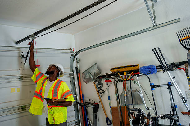 Professional Garage Door Spring Repair technician working in New Market, AL
